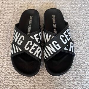 Opening Ceremony Black Logo Slides